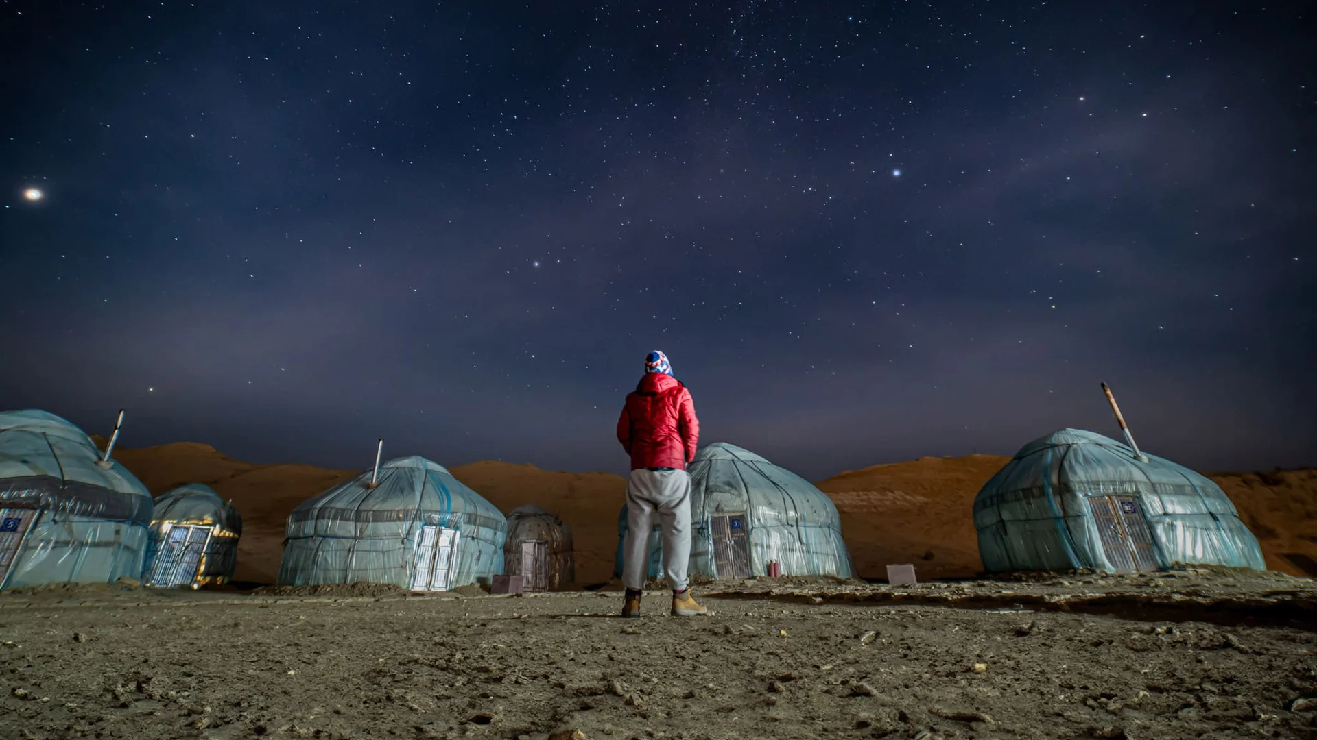 Isolated cabin in Argentina by Atlantic coast under night sky